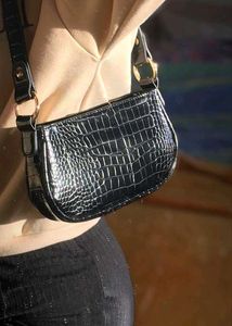women black trendy sling bag
