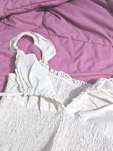 Cute White Top With Cutout Boarder Front Tying