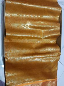 # Party Wear Maroon Silk Saree Golden Border.