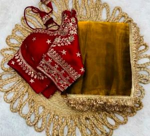 Pintresty Red Blouse With Golden Saree