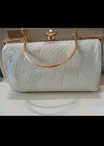 Elegant White Embossed Clutch with Gold Frame