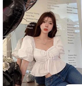 Coquette White Peplum Top