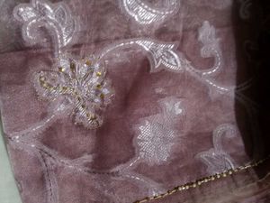 Elegant Mauve Embroidered Fabric Saree
