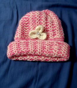 Pink & Cream woolen women cap.