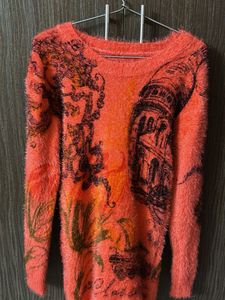 Fuzzy Orange Graphic Sweater