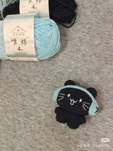 Crochet Black Cat With Headphones