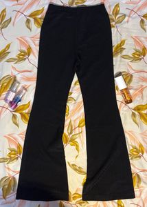 hnm black glittery flare pants