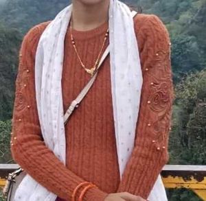 Cozy Knit Sweater with Embellishments