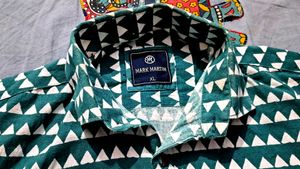 Branded T-shirt/shirt combo.