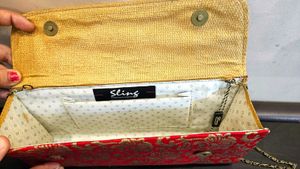 Womens Party Wear Red Sling Clutch from Pantaloons