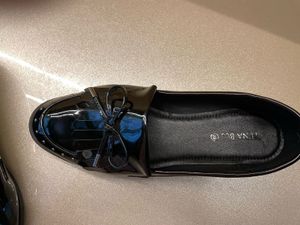 new bright shiny black westside loafers