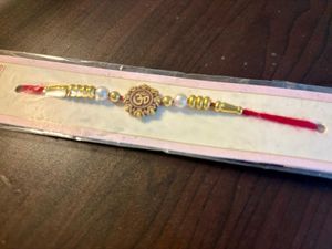 Buy 1 Rakhi Get Kalyan Jewellery 2100 Voucher Free