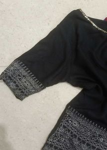 Kurti With Sequin And White Embroidery Like Detail