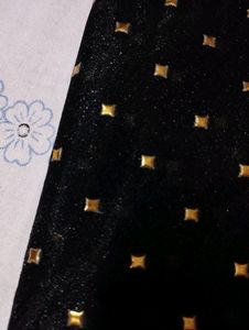 Black Fabric With Golden Design