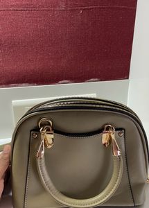Brand new handbag with Detachable Sling Belt