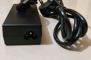 New Unused 65W Laptop Power Adapter