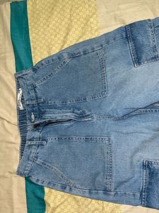 light blue colour shirt with a laces in back side