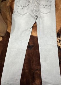 Ripped Grey Denim Jeans