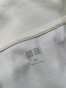 Uniqlo Men Cotton Mix Cream Printed Polo Tshirt