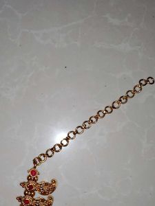 Elegant Gold-Toned Necklace with Red Stone Pendant