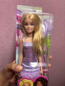 Barbie Doll in glittery purple dress