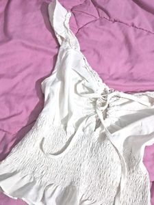 Cute White Top With Cutout Boarder Front Tying