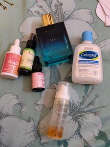 6 Empty bottles of perfumes and serum
