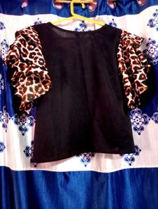 Animal print black ruffle sleeveless top