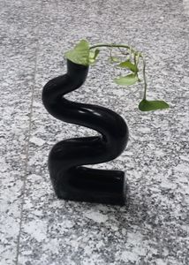 Modern Black Vase with Floral Arrangement