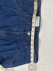 High-Waisted Pleated Jeans