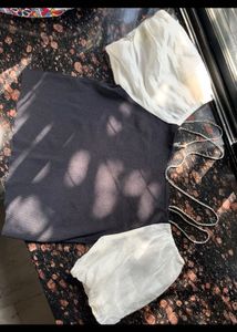 Off shoulder top with rhinestone neckline