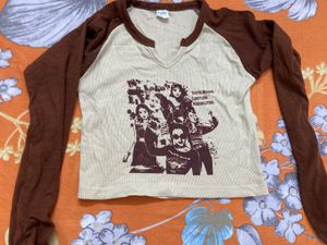 Graphic Raglan Long Sleeve Top