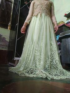 Heavy Embroidered Net Party Wear Long Gown With Du