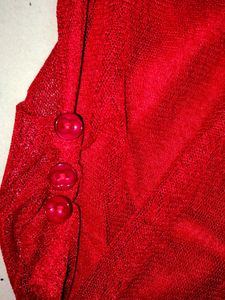 Red Sleeveless top.