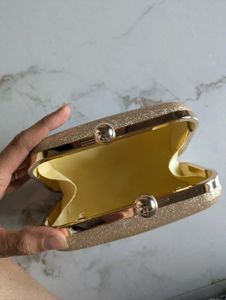 Smart Gold Clutch