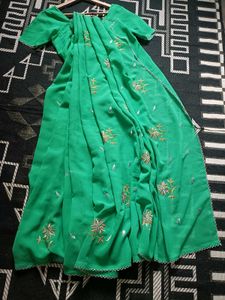 Green embroidered saree with blouse