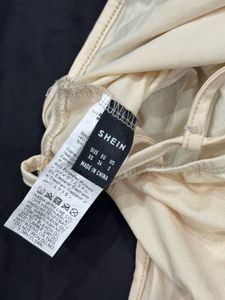 Creamy One-Piece Bodysuit