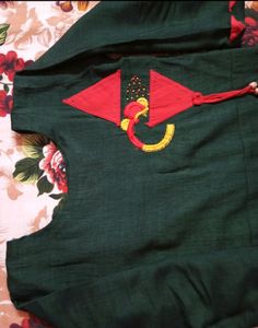 Dark Green Kurti With Design