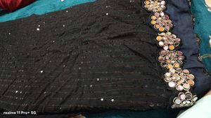 Embellished black saree