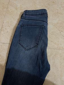 Blue mid waist Denim Jeans.pair up with boots