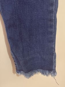Ripped Blue Denim Jeans
