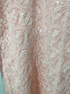 This pink colored georgette Plazo Suit