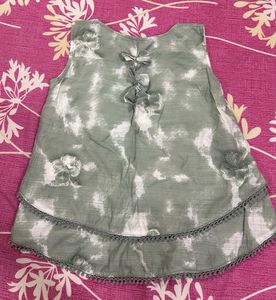Green Sleeveless Top with Bows &amp; Tassels