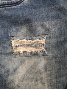 Women Ripped Faded Blue Jeans