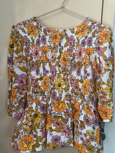 Floral Smocked Peplum Top