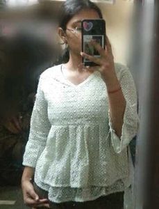 Embroidered Peplum Top