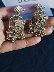 One necklace,  A Pair Of Earring