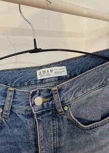 Ripped Straight Leg Jeans