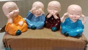 Set Of 4 Buddha Showpiece