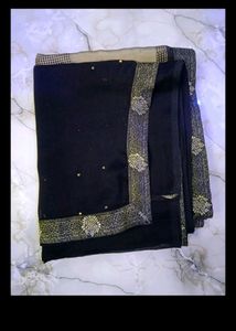 pretty olive black saree.